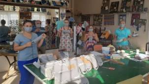 Seferihisar Belediyesi günlük 100 maske üretiyor